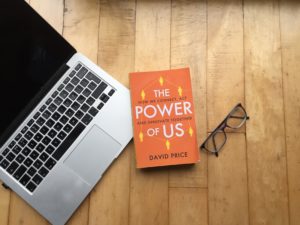 The Power of Us book image plus computer and glasses